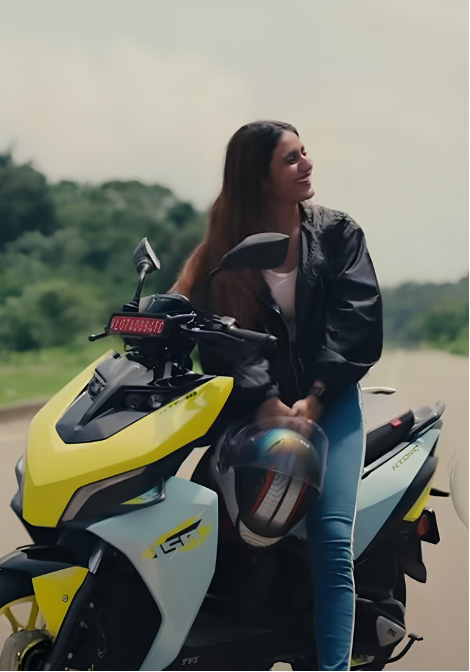 Campaign creator with a yellow TVS NTORQ 150 scooter