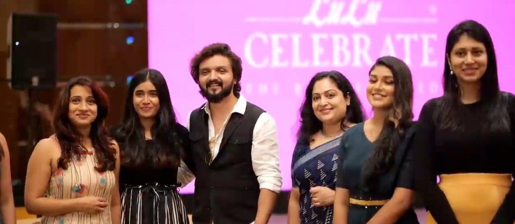 Creators and hosts in front of the LuLu Celebrate backdrop at the Kochi weddingwear launch