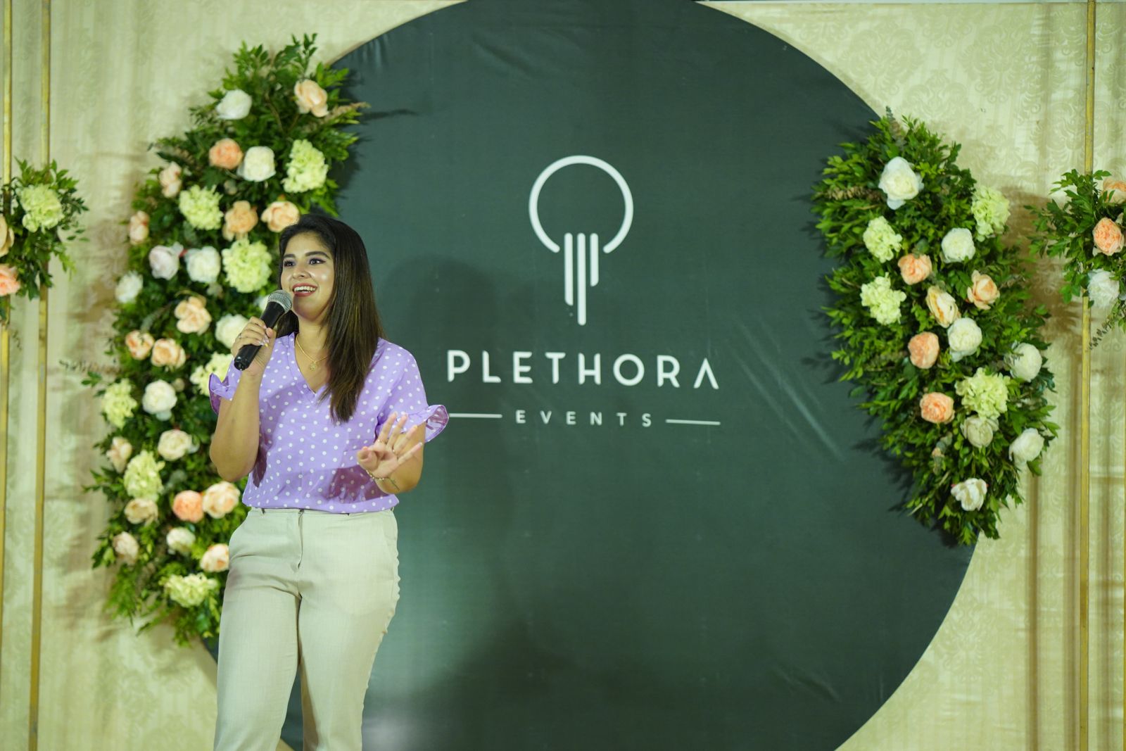 Plethora Events speaker presenting on stage